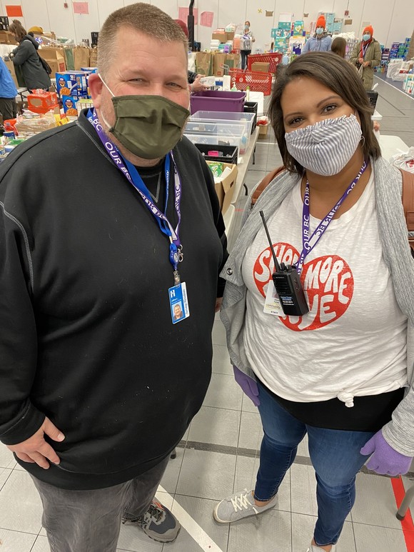 Essential item donations in the Blue Barn gym in Brooklyn Center.