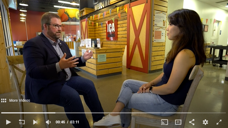 Commissioner LaTondresse talking to a reporter at ICA Food Shelf
