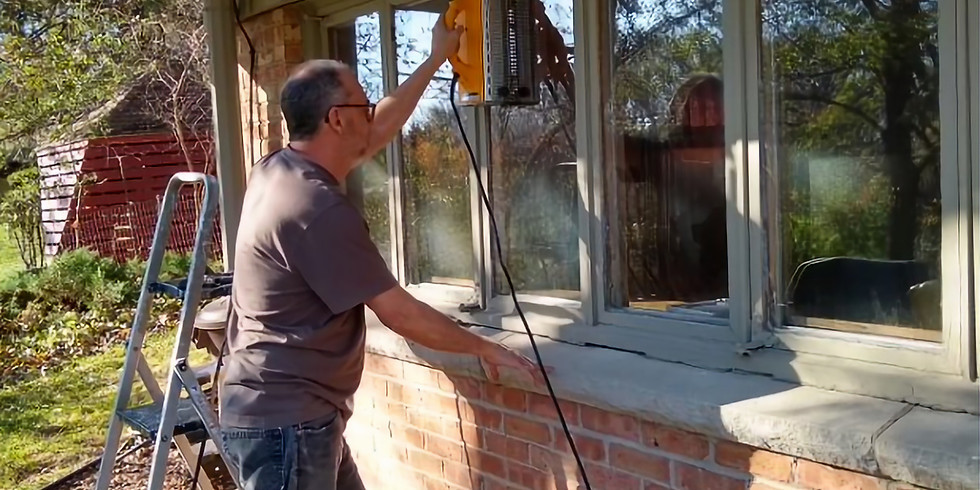 Man installing window