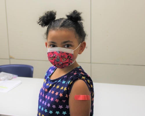 Kid getting their COVID-19 Vaccine 