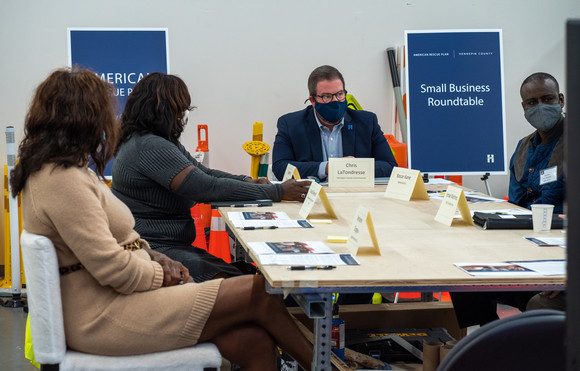 Commissioner LaTondresse with a group of small business ownesr