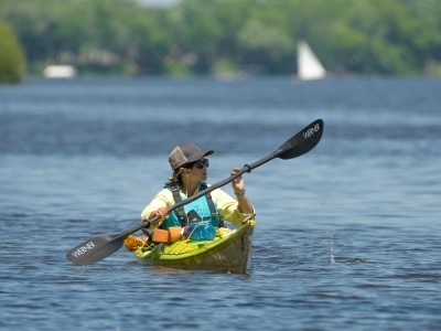 Person kayaking on a lake