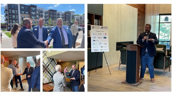 Commissioner LaTondresse speaking and conversing with various people