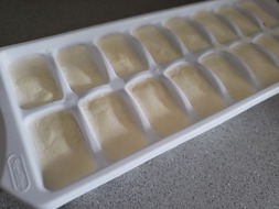 Heavy cream in an ice cube tray