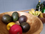 Avocados and fruit in basket