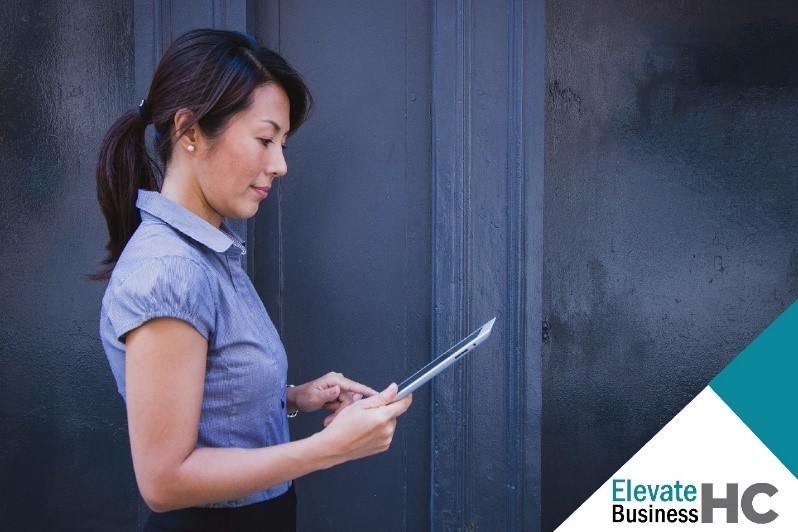 Woman looking at an iPad
