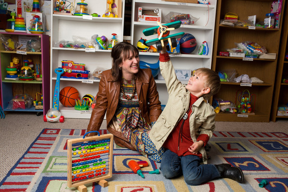 Mom and son playing with borrowed toys