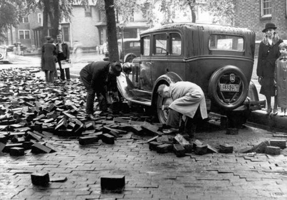 Heavy rainfall in June, 1935 turned many Minneapolis streets into a pile of bricks.