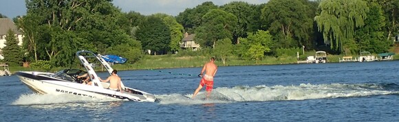 Boat towing a water skier