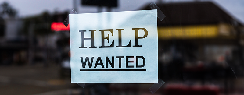 Small help wanted sign