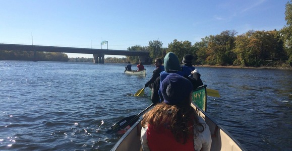 Youth canoeing on the Mississippi River