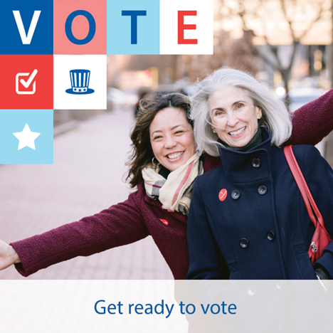 Two women in fall excited to vote