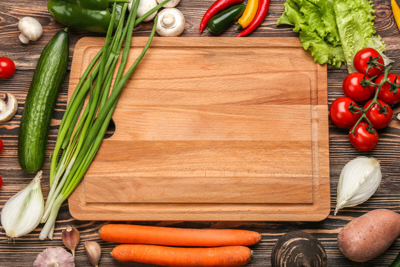 Stock photo veggies and cutting board