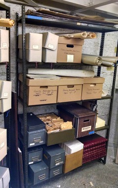 Assorted archive boxes on shelves