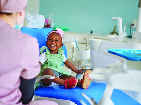 Smiling girl at dentist