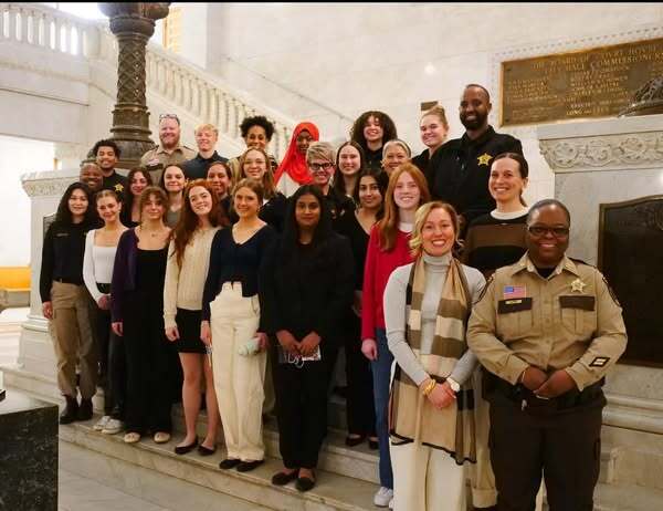 Commissioner Edelson poses with her intern cohort at Minneapolis City Hall.