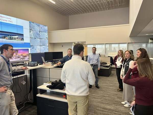 Commissioner Edelson listens to Public Works staff describe traffic logistics.