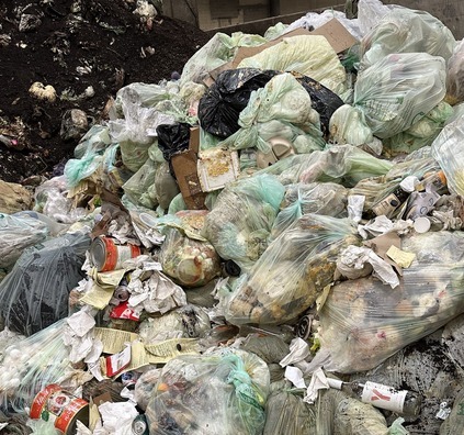 Pile of contaminated organics recycling at Brooklyn Park Transfer Station