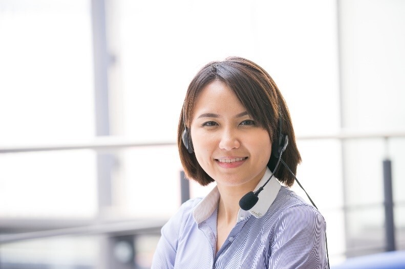 receptionist wearing a microphone headset