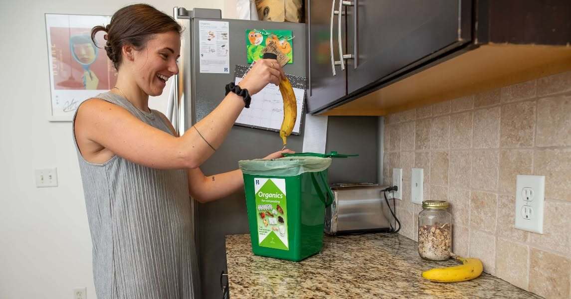 woman holding banana peel