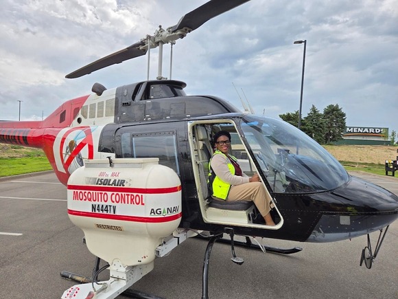 Commissioner Conley in a helicopter