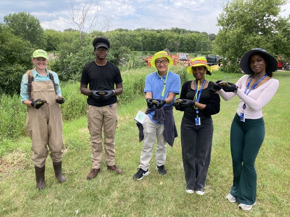 Green Pathways interns helping monitor the habitat for painted turtles