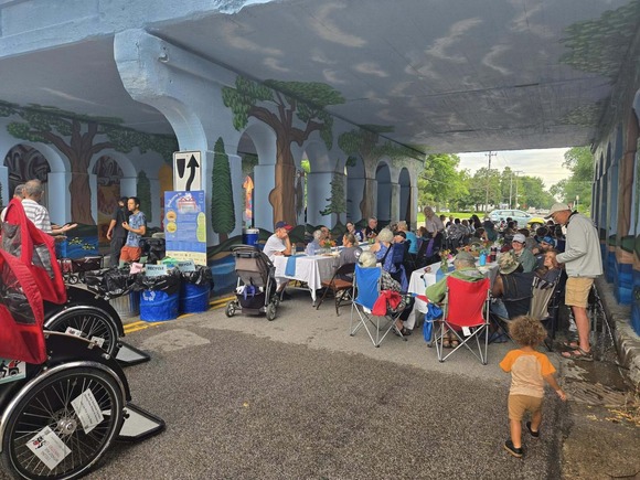 community potluck under the bridge