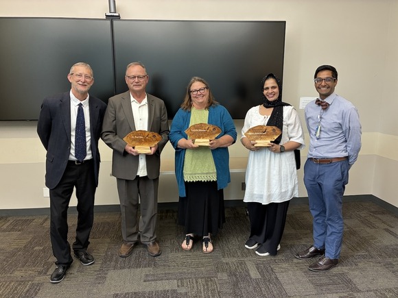 Provider recognition awards recipients smiling with their awards  