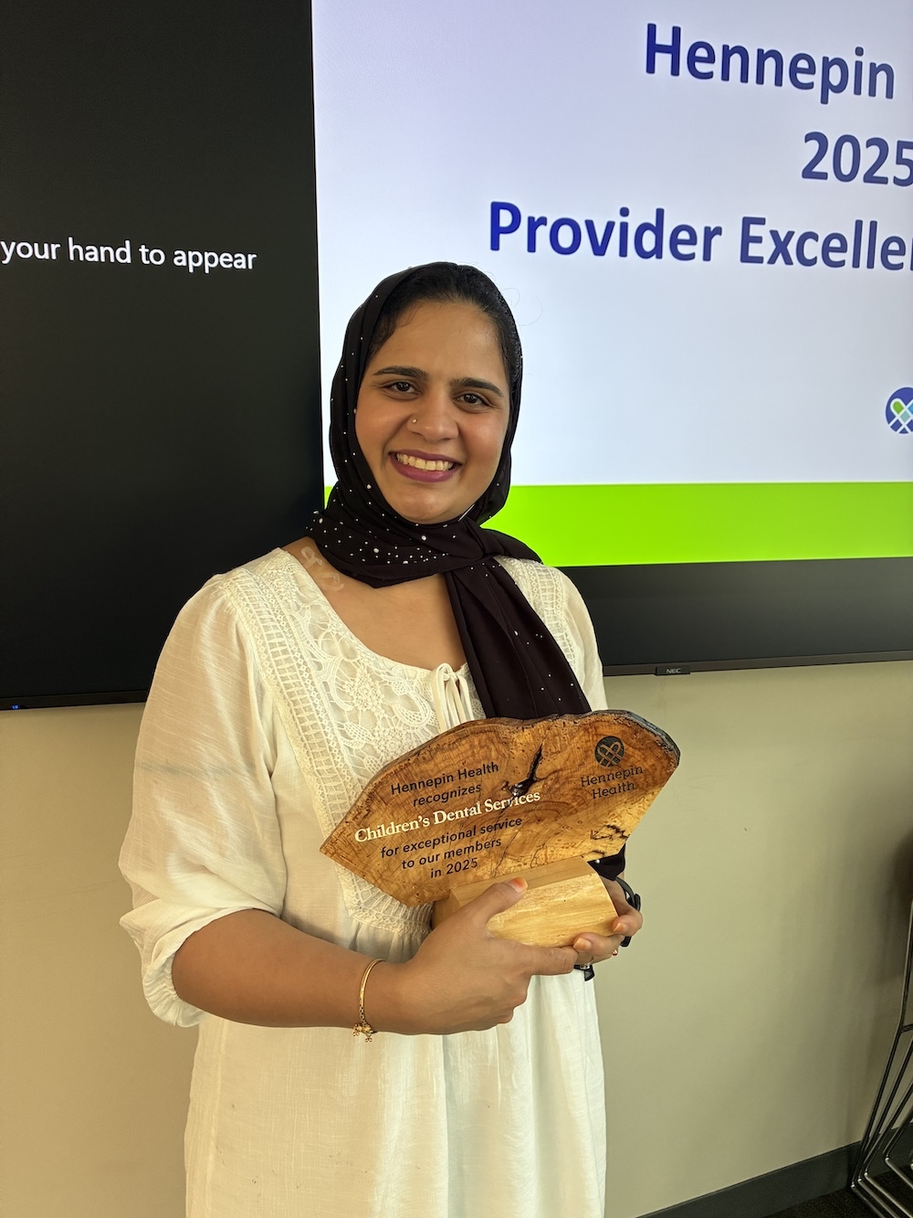 Award winner Sadiya posing with award