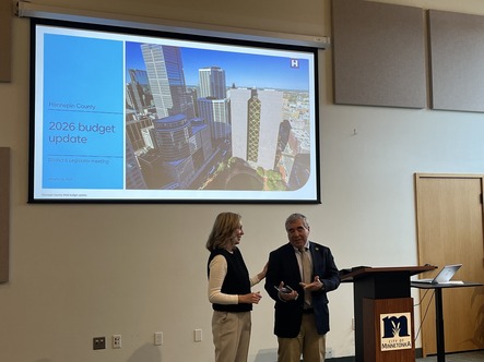 Heather presents Senator Cwodzinski with an award recognizing his public service.