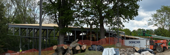 From the Bellaire side of the drive, the swoop and curve of the park porch canopy is visible at Westonka Library