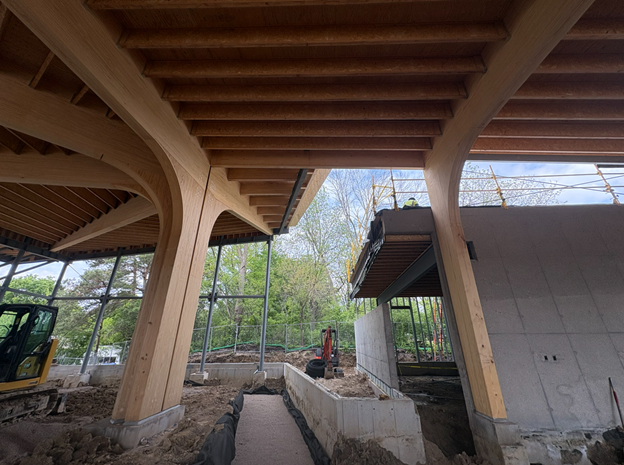 Trenches along the foundation walls for the under-slab ducts are prepped at Westonka Library