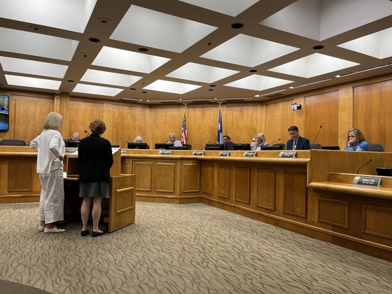 Commissioners Goettel and Edelson presenting 