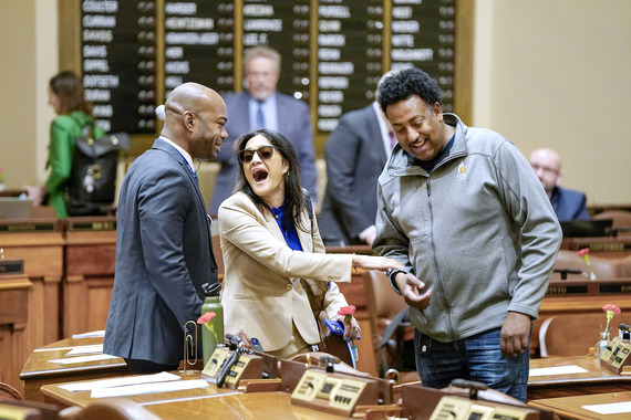 Rep. Maria Isa Perez-Vega laughs on House Floor