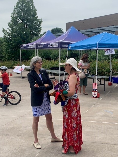 Rep. Klevorn speaking with a constituent in Plymouth