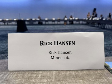 Name tent saying "Rick Hansen" in bold letters with "Rick Hansen Minnesota" in smaller letters