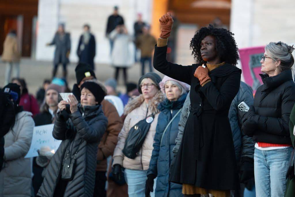 Rep. Momanyi-Hiltlsley stands in solidarity with Renee Good supporters at a State Capitol vigil.
