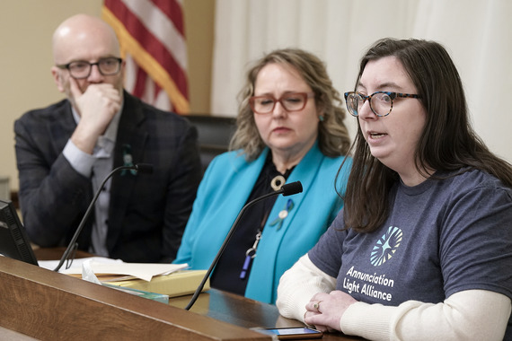 Annunciation parent testifying in committee alongside Reps. Tabke and Greenman