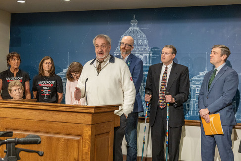 Hansen speaking at Parkinson's press conference