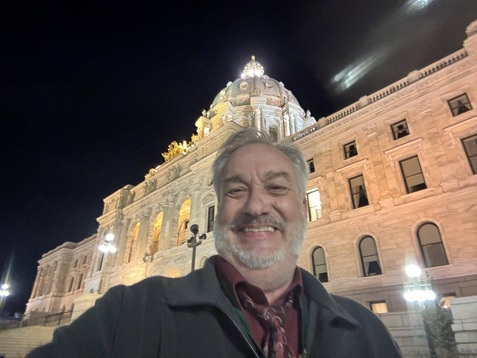Rep. Hansen outside the State Capitol at night