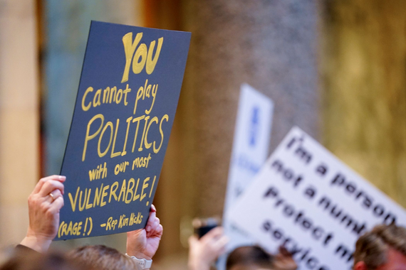 PROTEST SIGN WITH QUOTE FROM HICKS