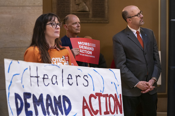 Rep. Pinto at Capitol rally next to woman w/