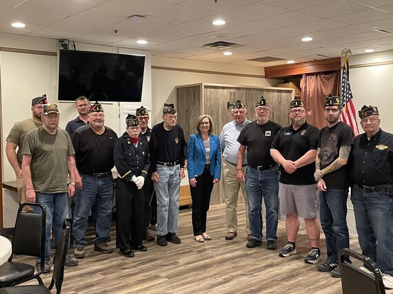 Robbins with members of Osseo/Maple Grove American Legion