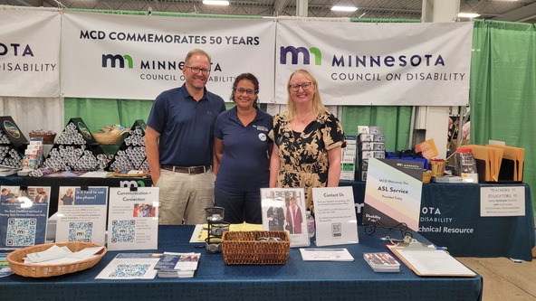Director Aisha with DEED staff at the Minnesota Council on Disability Booth at the State Fair
