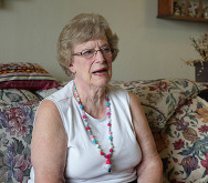 Woman on a floral couch 2