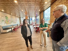 Community Development Director Whitney Ridlon, Commissioner Ida Rukavina, Doug Arndt, Crosby Lofts owner