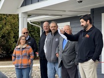 Adam Venne speaks at emergency family housing grand opening