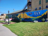  Custom-built scale model U.S. Forest Service (USFS) floatplane and mural at the Puddle Jumper Park in Ely. 