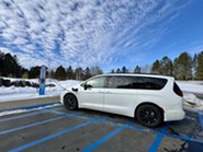 White Van Charging on Electric Vehicle Charger at Iron Range Resources & Rehabilitation