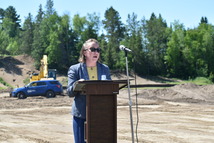 Commissioner Ida Rukavina speaks at Wilderness Escape groundbreaking